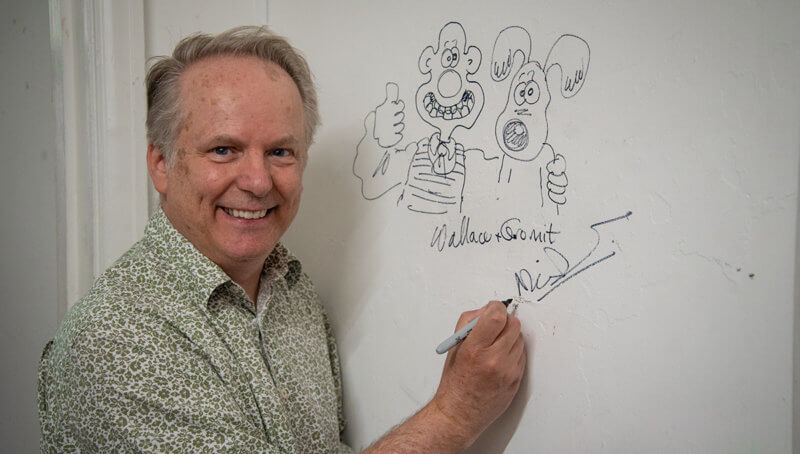 Nick Park signing wall next to 'Nick Park' room where he created Wallace & Gromit at NFTS