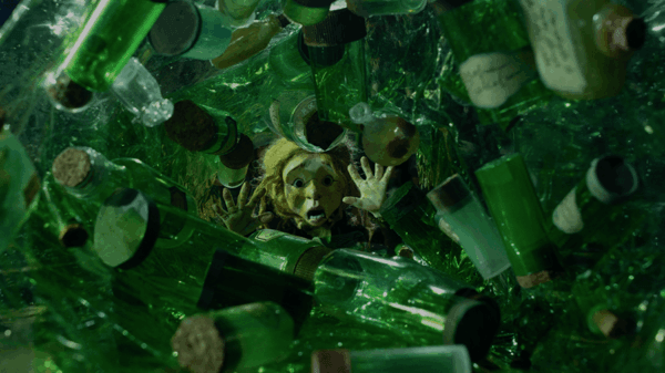 Shot of Eddie amidst a sea of pickled jars, Pickled (2026)